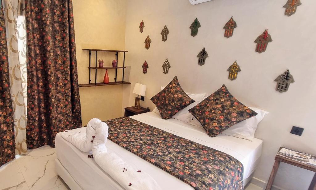 Postel nebo postele na pokoji v ubytování Stylish hôtel
