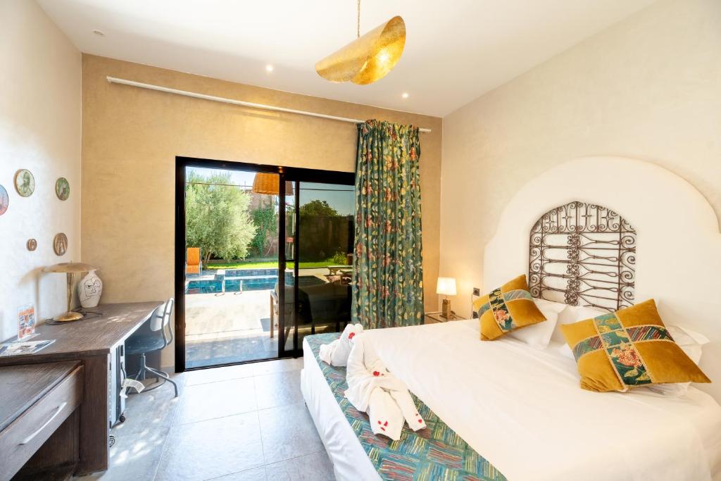 Postel nebo postele na pokoji v ubytování Stylish hôtel