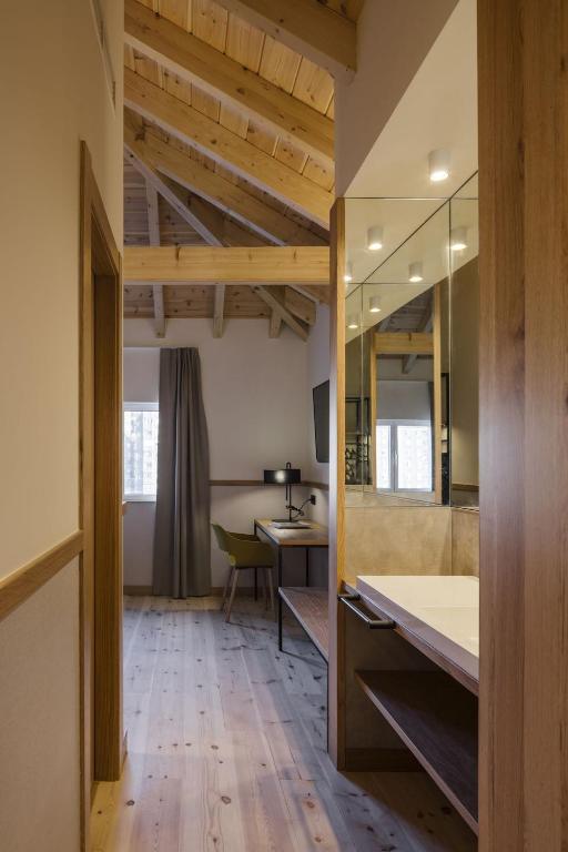 Postel nebo postele na pokoji v ubytování Sercotel El Balcón de la Bahía Suites