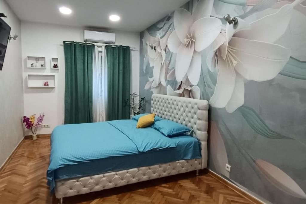 Postel nebo postele na pokoji v ubytování Venera Lux Apartman