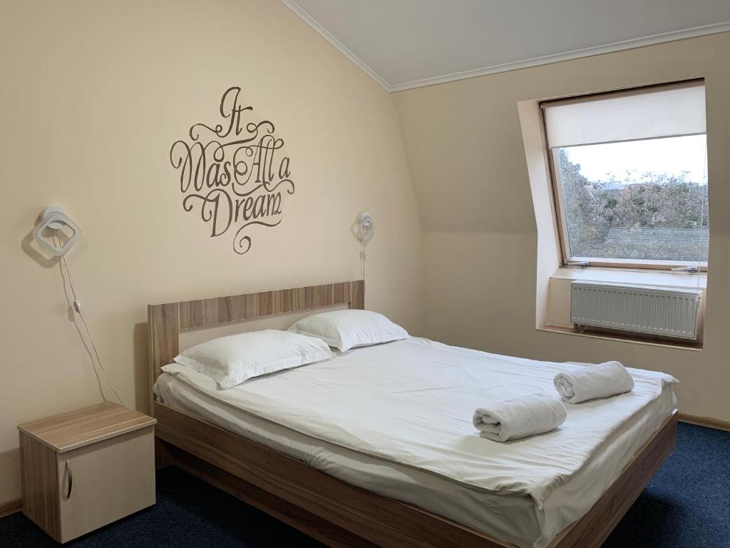 Postel nebo postele na pokoji v ubytování Budget Hotel Ekotel