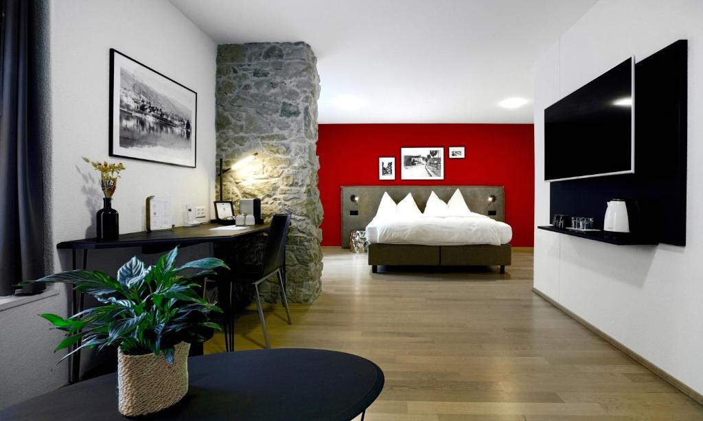 Postel nebo postele na pokoji v ubytování Hotel Zugertor