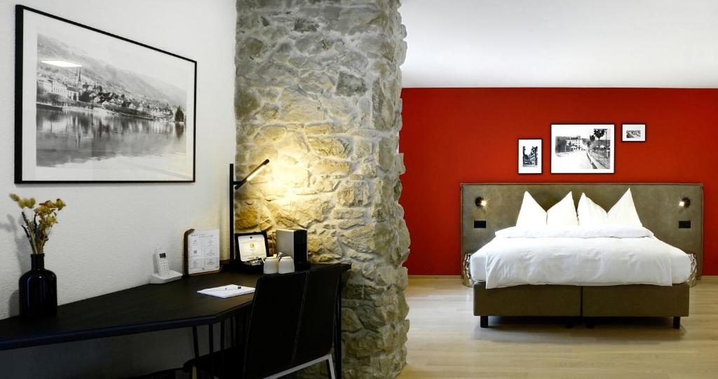 Postel nebo postele na pokoji v ubytování Hotel Zugertor