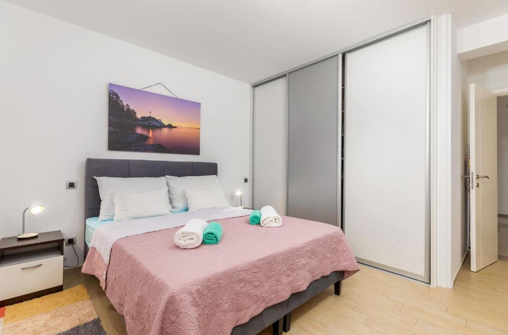 Postel nebo postele na pokoji v ubytování Villa Gigetto
