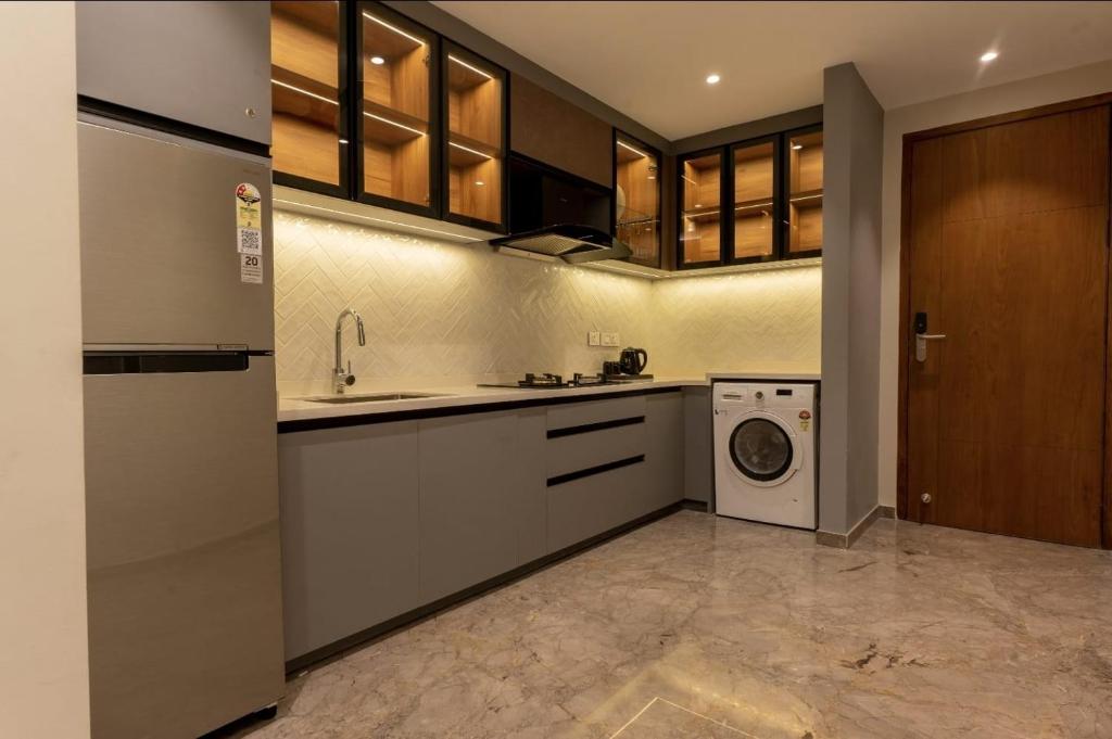 Kuchyň nebo kuchyňský kout v ubytování Seashell Apartments