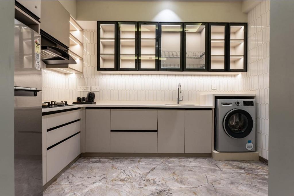 Kuchyň nebo kuchyňský kout v ubytování Seashell Apartments