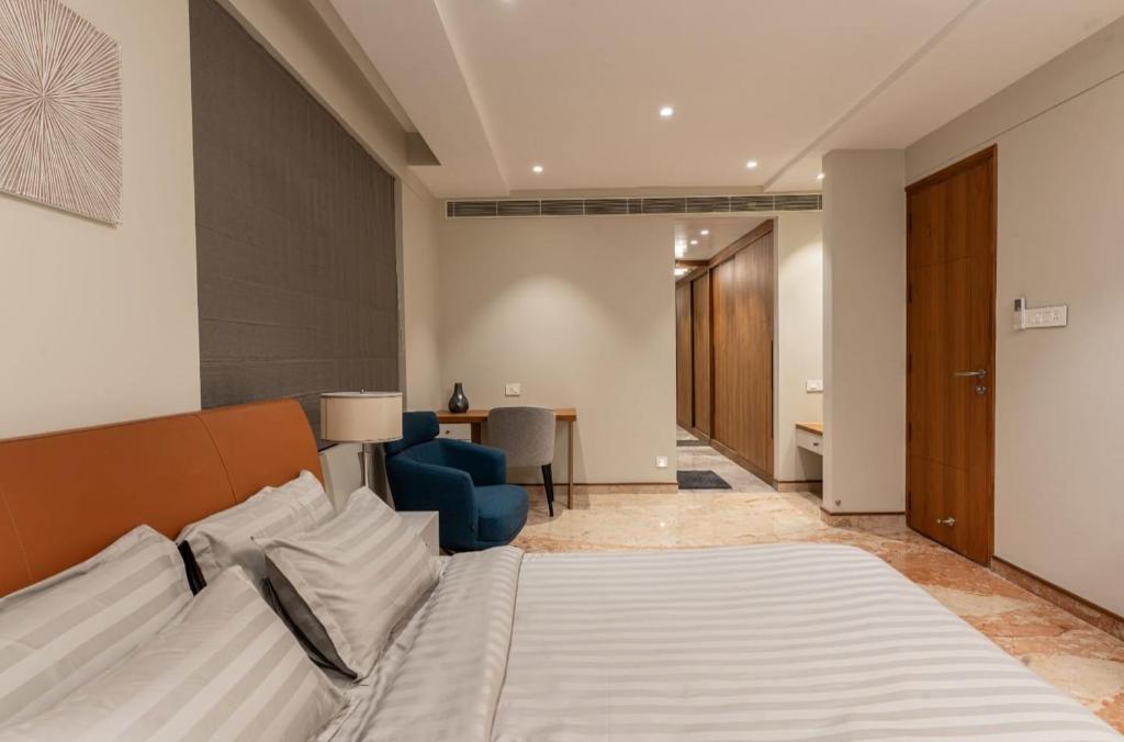 Postel nebo postele na pokoji v ubytování Seashell Apartments