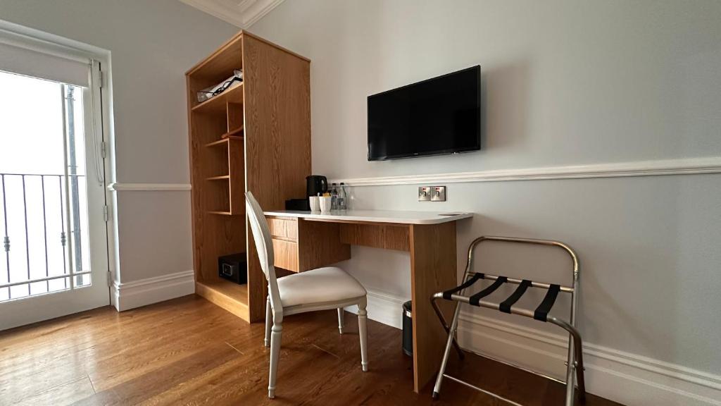 A television and/or entertainment centre at Sweeney's Hotel 2020 Limited