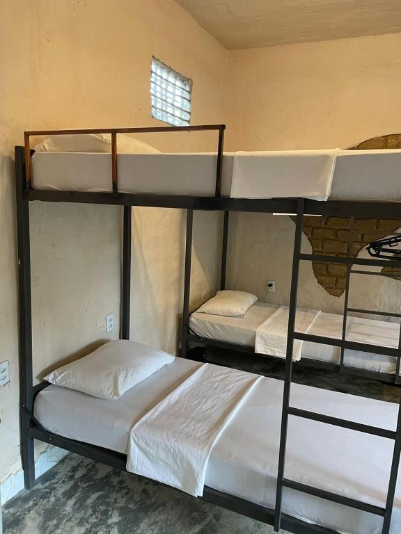 Postel nebo postele na pokoji v ubytování Eco Hostel Bosque di Barro