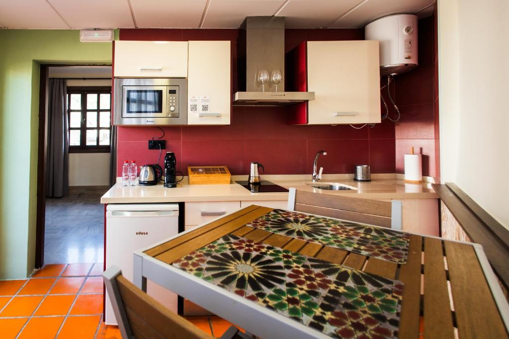 Kuchyňa alebo kuchynka v ubytovaní Apartamentos Reyes Católicos