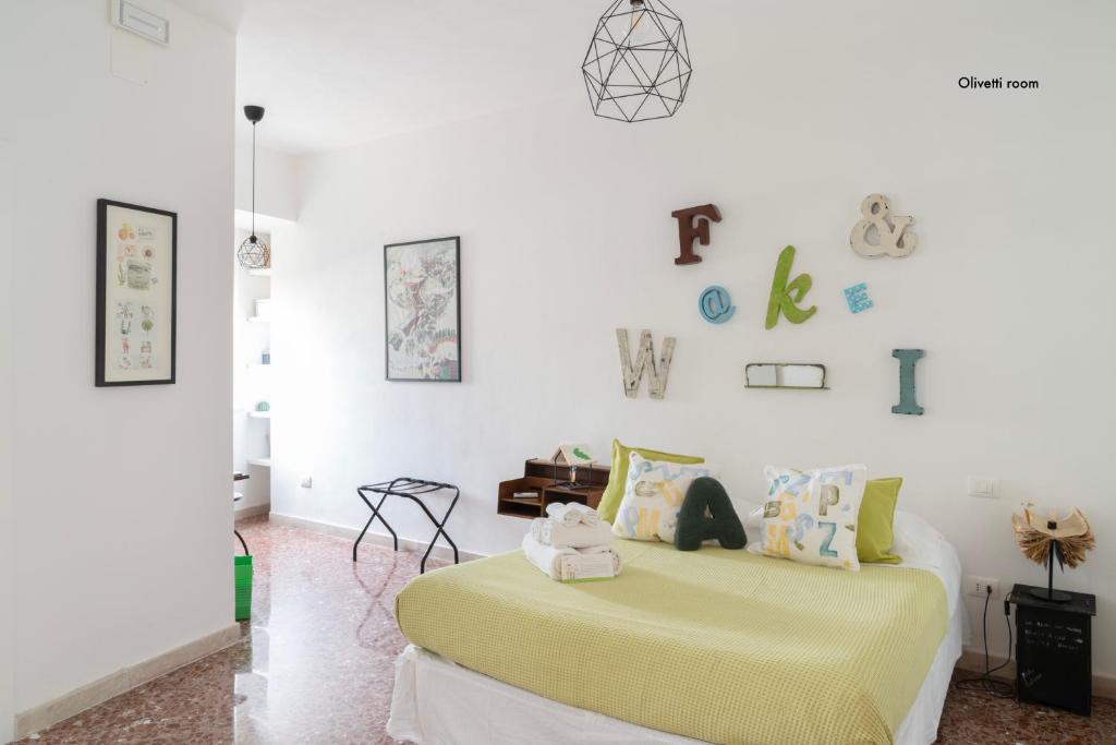 Ένα ή περισσότερα κρεβάτια σε δωμάτιο στο Casa VerbaVolant