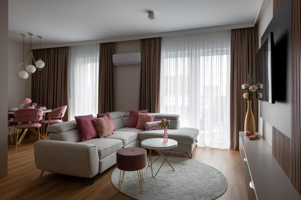 Zona de estar de Apartament Piwonia