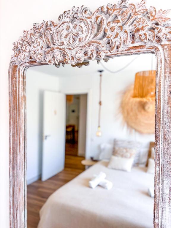 Postel nebo postele na pokoji v ubytování Chakra House Fuerteventura - Affordable Rooms in a Cozy Guesthouse