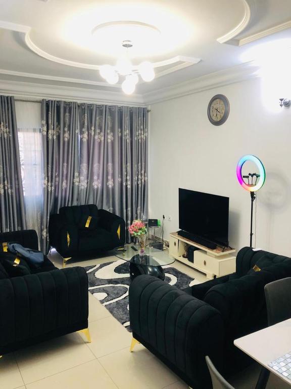 TV a/nebo společenská místnost v ubytování Madoo Appartement