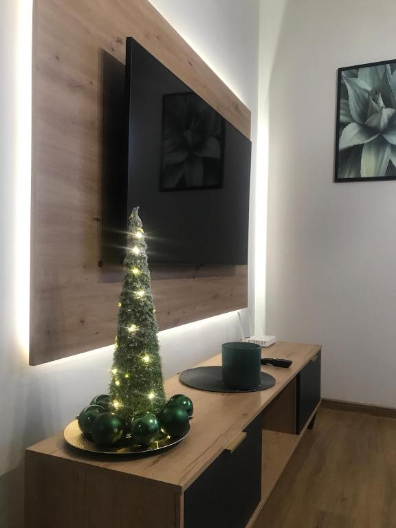 Televízia a/alebo spoločenská miestnosť v ubytovaní Apartament No 34 Green - Holiday Home Zator