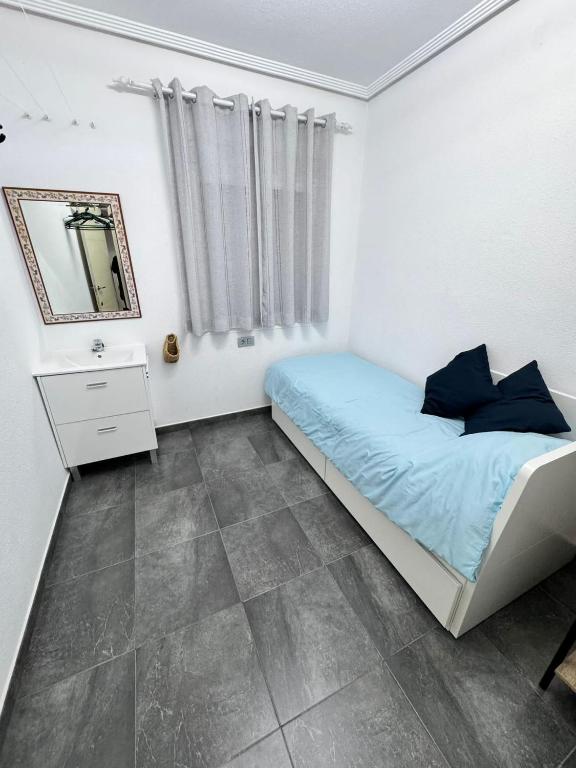 Posteľ alebo postele v izbe v ubytovaní Casa La Paz