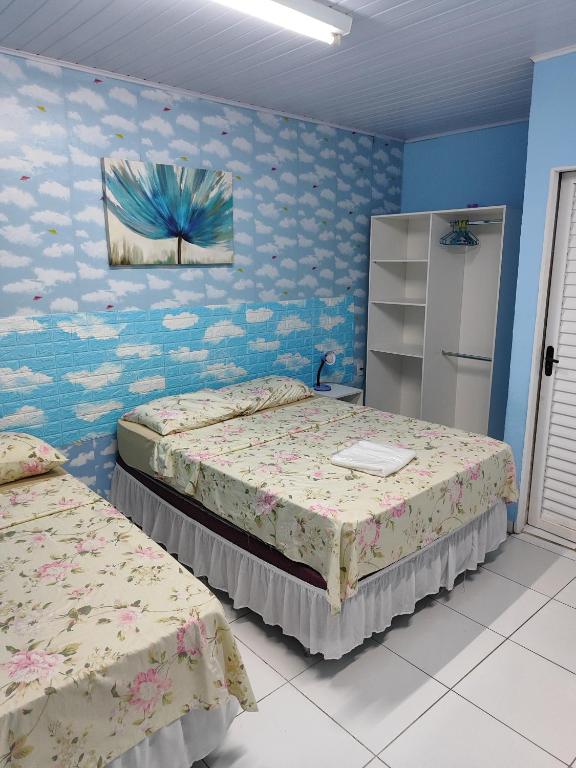 Postel nebo postele na pokoji v ubytování Hotel Colors Manaus