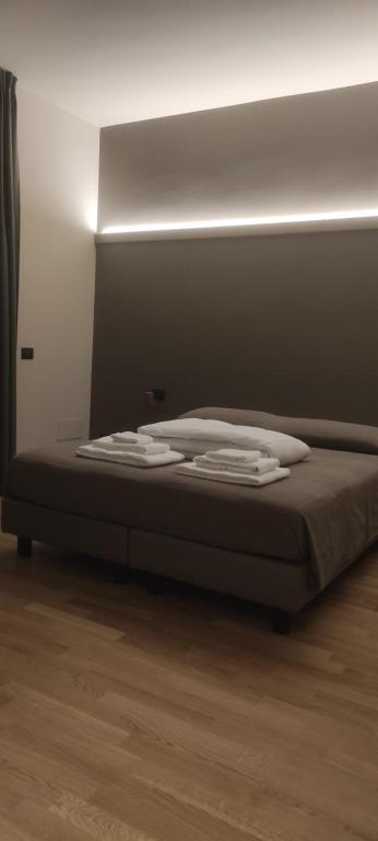 Postel nebo postele na pokoji v ubytování BnB Greppi 9