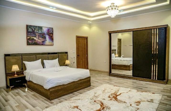 Postel nebo postele na pokoji v ubytování Maktub Pyramids Hotel