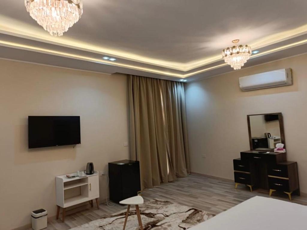 TV a/nebo společenská místnost v ubytování Maktub Pyramids Hotel