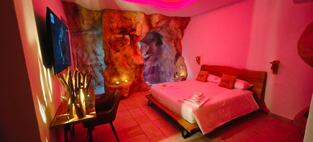 Postel nebo postele na pokoji v ubytování Kira suite and rooms