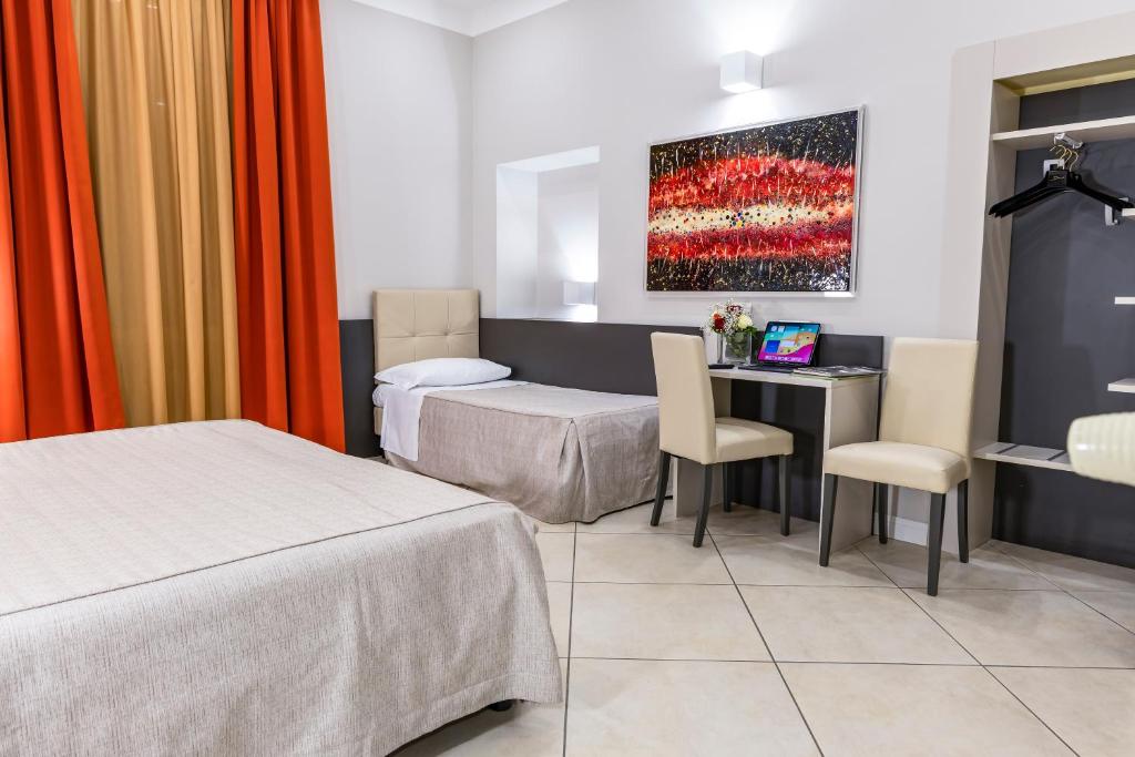 Postel nebo postele na pokoji v ubytování Hotel Demo'
