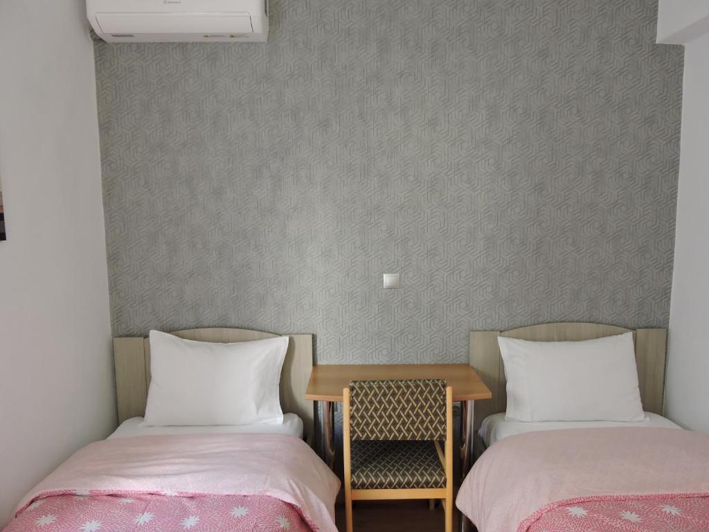 Posteľ alebo postele v izbe v ubytovaní Spiri's House-Deluxe Apartment in Kalabaka-Meteora