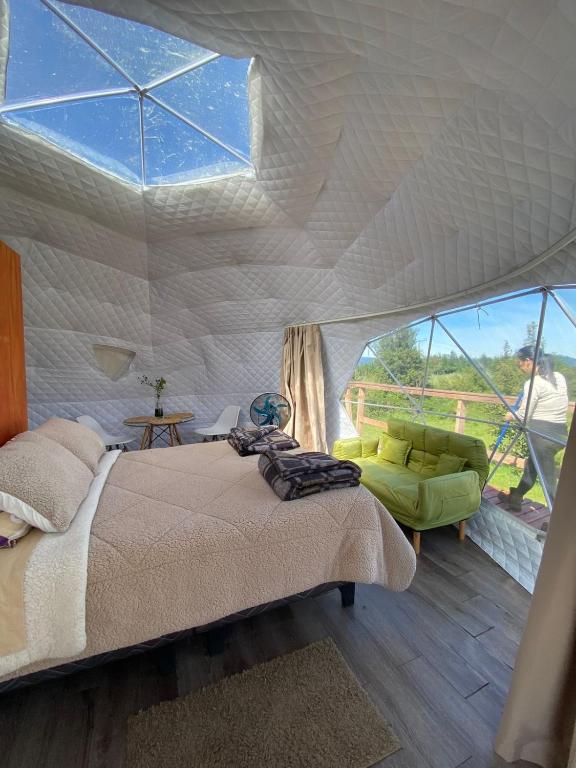 Postel nebo postele na pokoji v ubytování Milenaria Glamping
