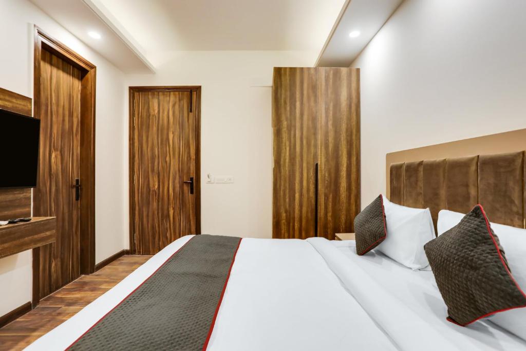 Postel nebo postele na pokoji v ubytování Super Townhouse MA-32
