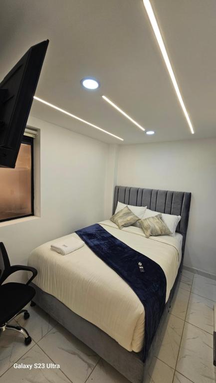 Postel nebo postele na pokoji v ubytování Hotel West Inn
