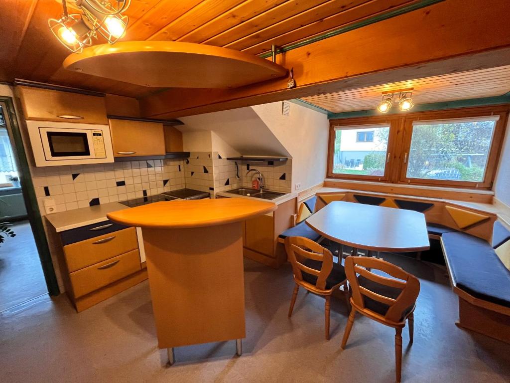 Kuchyň nebo kuchyňský kout v ubytování Jagerheim Apartments Flattach