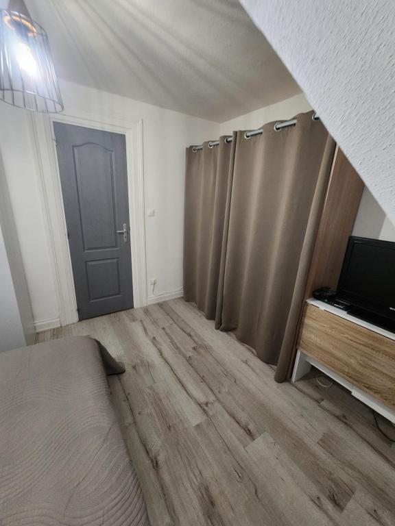 Postel nebo postele na pokoji v ubytování Gîte du logelbach