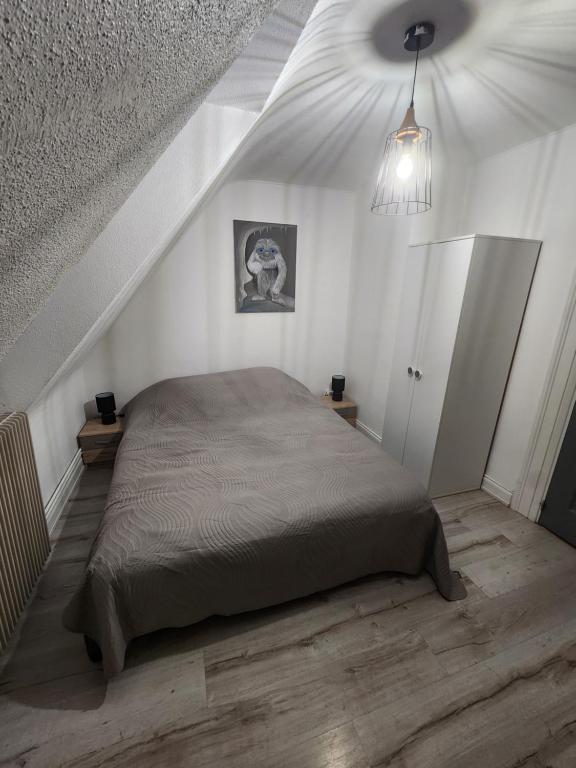 Postel nebo postele na pokoji v ubytování Gîte du logelbach