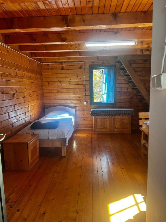 Postel nebo postele na pokoji v ubytování Etno selo ŠTAVNA