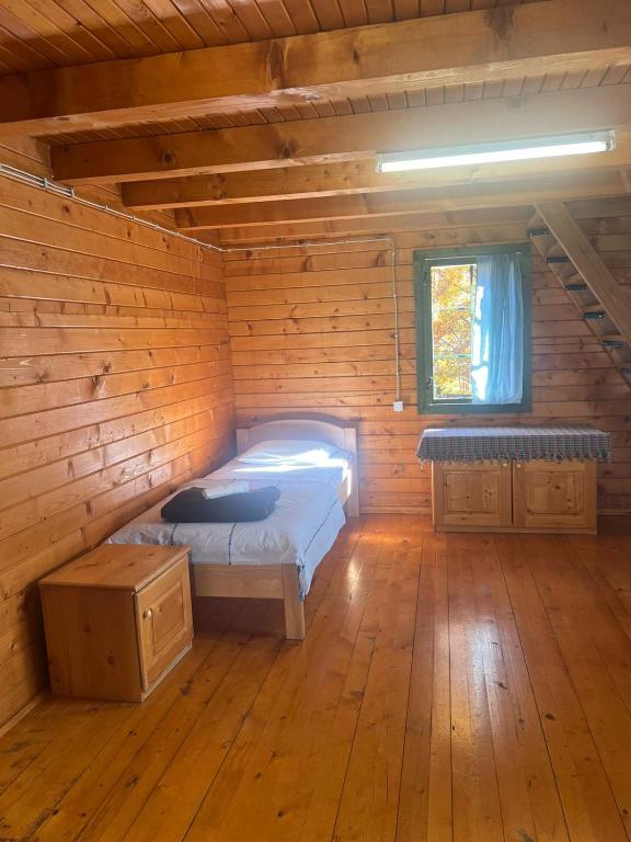 Postel nebo postele na pokoji v ubytování Etno selo ŠTAVNA
