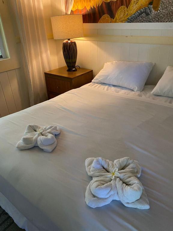 Postel nebo postele na pokoji v ubytování Wild Ginger Hotel