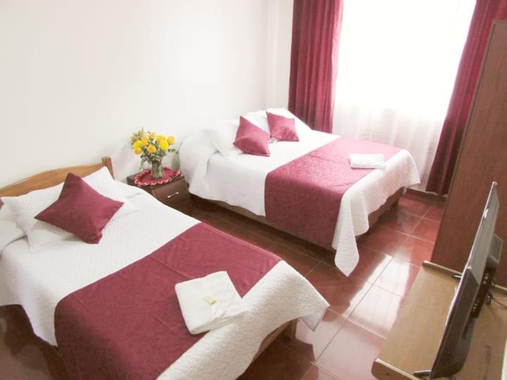 Postel nebo postele na pokoji v ubytování Touristic House