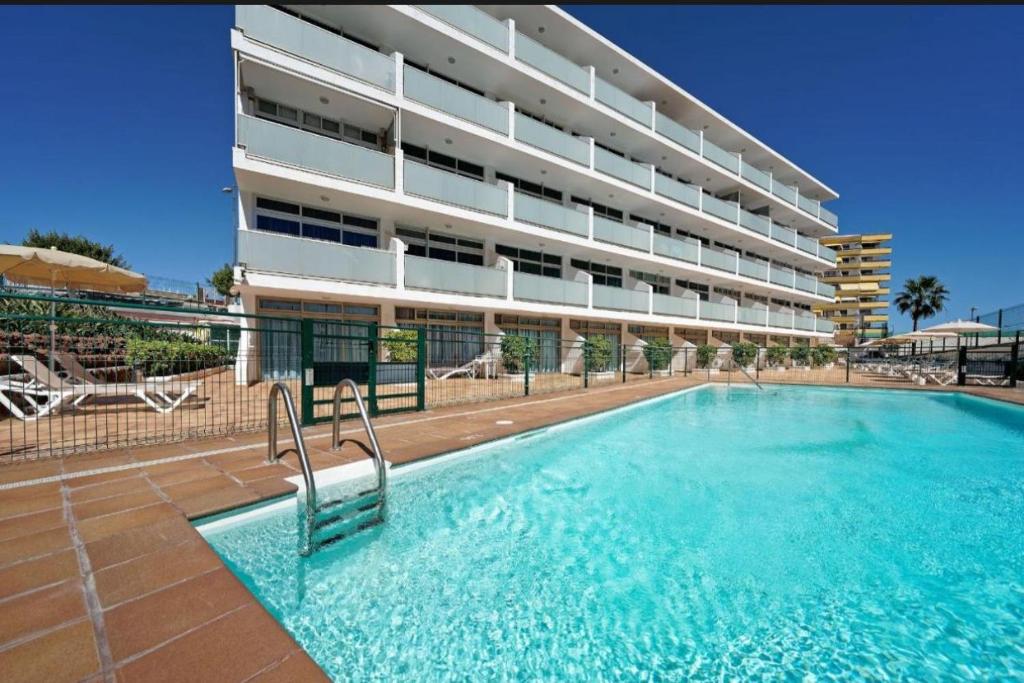 Swimmingpoolen hos eller tæt på Apartamento Anau- Playa - Yumbo