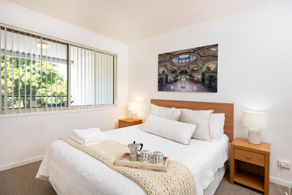 Ένα ή περισσότερα κρεβάτια σε δωμάτιο στο The Marina Unit 310