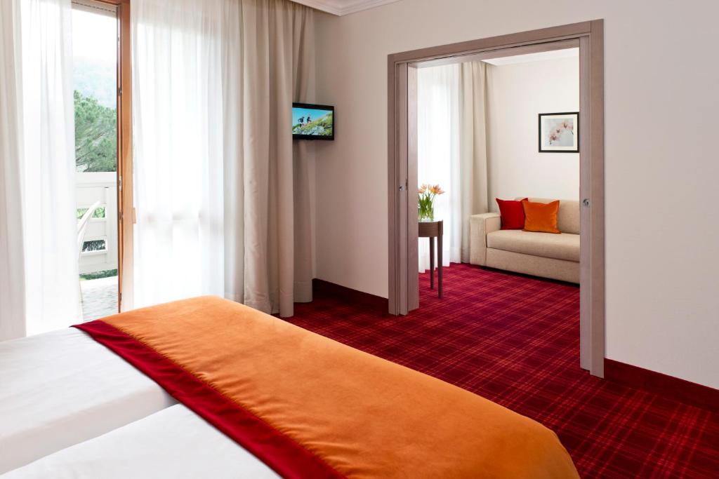 Postel nebo postele na pokoji v ubytování Hotel Apollo Terme
