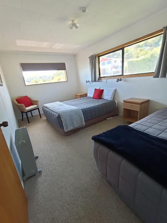 Postel nebo postele na pokoji v ubytování Moeraki Beach Motels