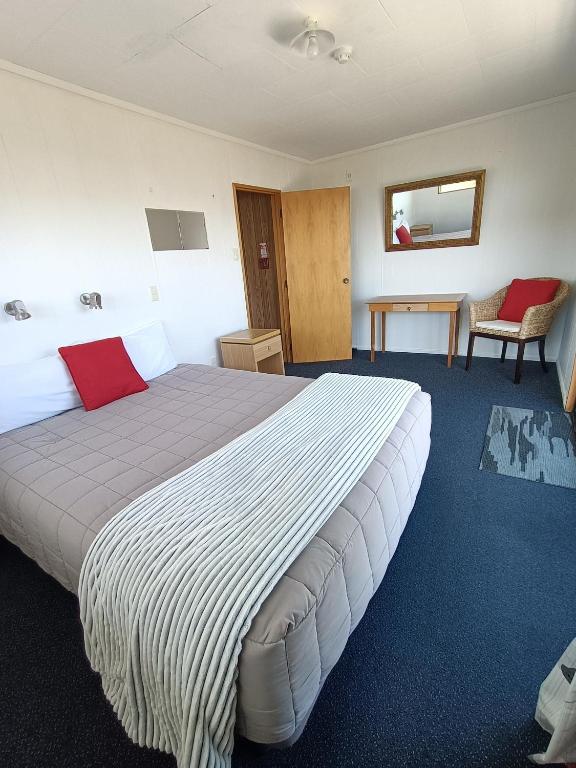 Postel nebo postele na pokoji v ubytování Moeraki Beach Motels