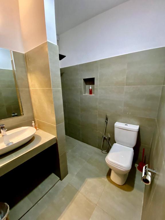Koupelna v ubytování Reef Bungalow Hotel