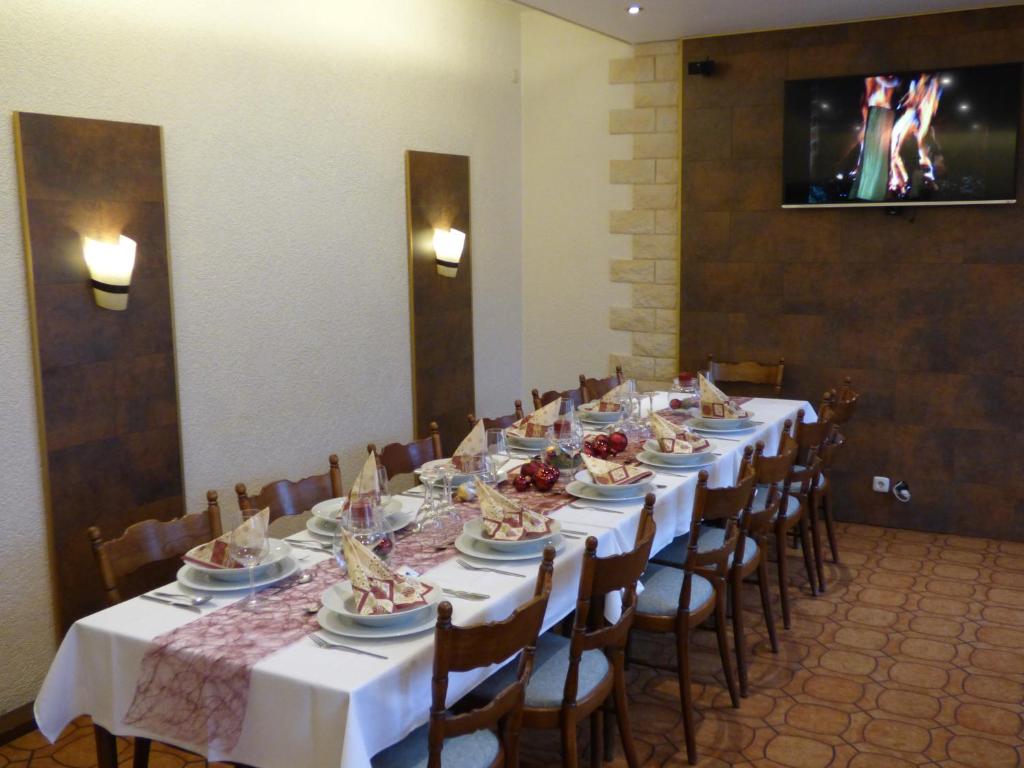 TV a/nebo společenská místnost v ubytování Hotel Nußknacker