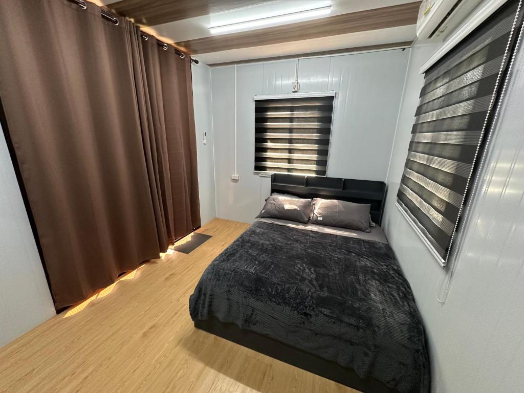 Postel nebo postele na pokoji v ubytování U Cube Staycation