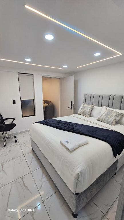 Postel nebo postele na pokoji v ubytování Hotel West Inn