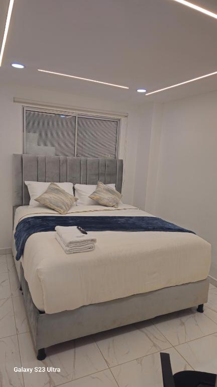 Postel nebo postele na pokoji v ubytování Hotel West Inn
