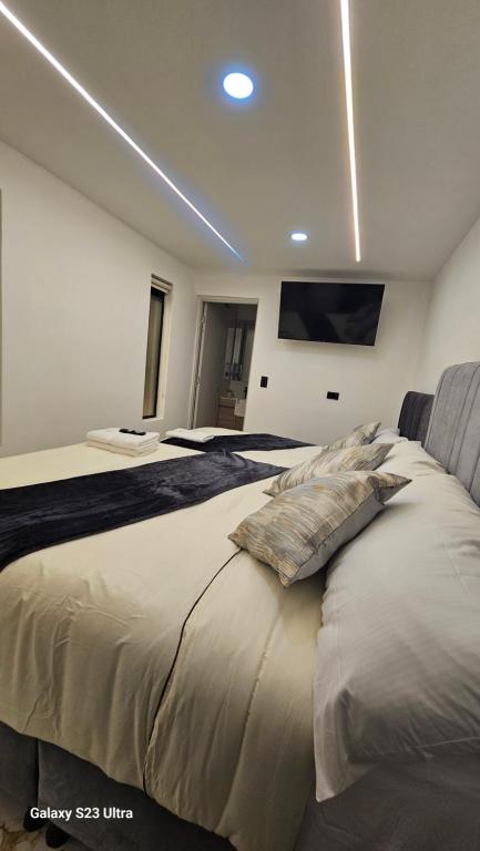 Postel nebo postele na pokoji v ubytování Hotel West Inn