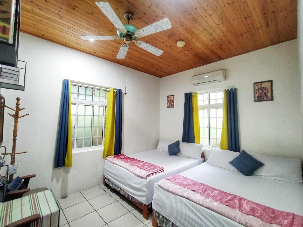 Postel nebo postele na pokoji v ubytování Haowangjiao Homestay