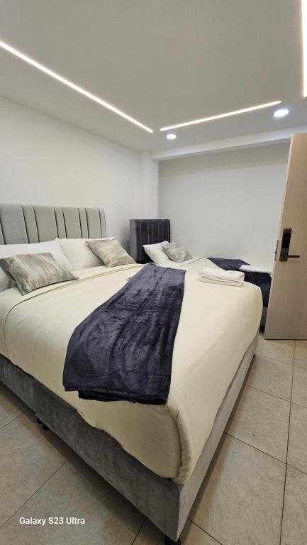 Postel nebo postele na pokoji v ubytování Hotel West Inn